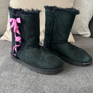 Great condition (besides seam tear on front sole) UGG Boots for Girls